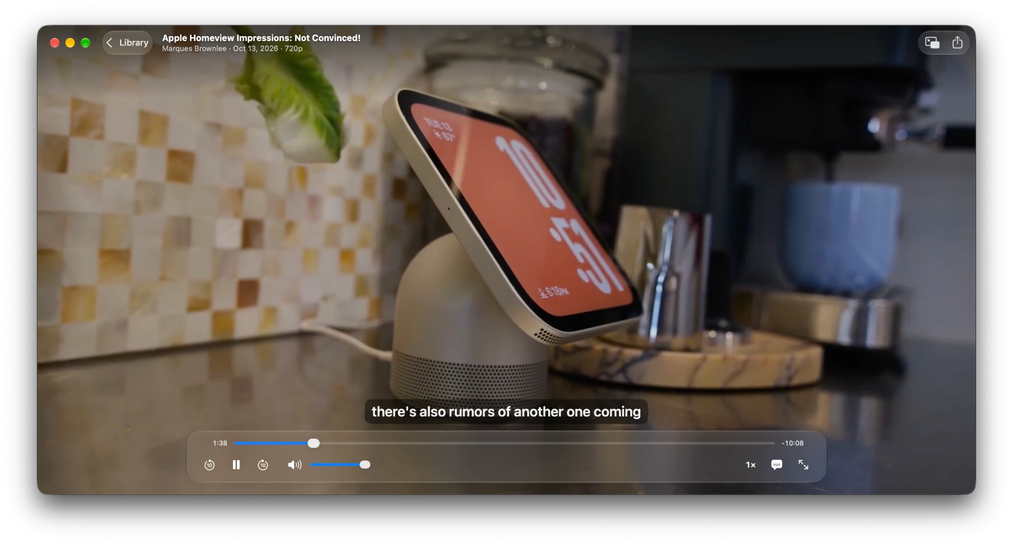 The player: a video filling the window with a title bar, a caption and the transport bar at the bottom.